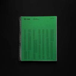 Buch mit metallischer Ringbindung und grünem Cover